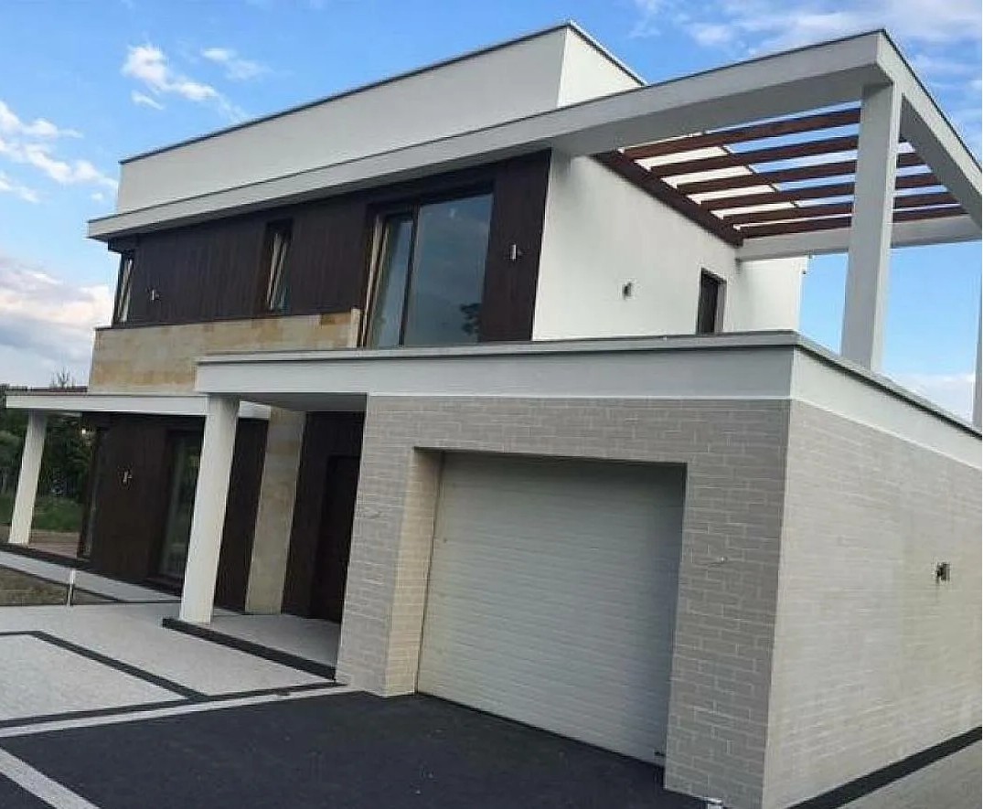 Gotowa elewacja domu jednorodzinnego w Warszawie - realizacja FillPro