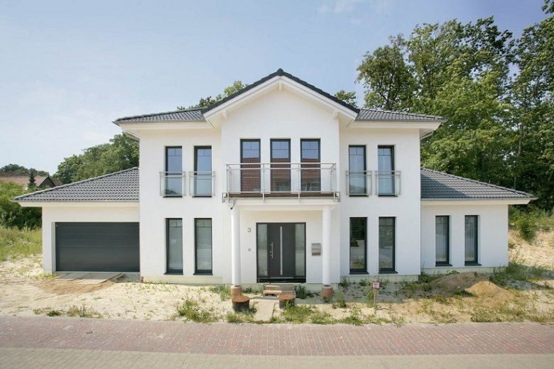 Gotowa elewacja domu jednorodzinnego w Warszawie - realizacja FillPro